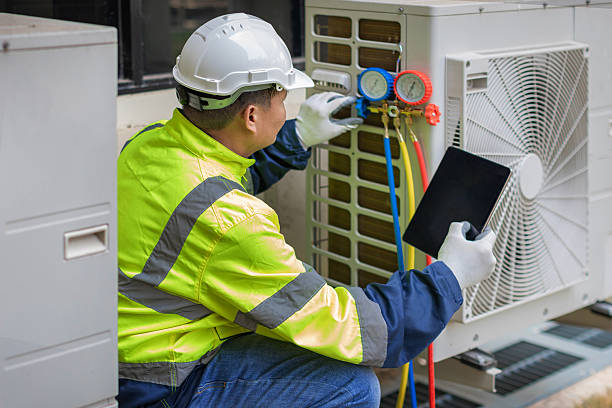 Professional Hvac technician working in Bryantville, MA